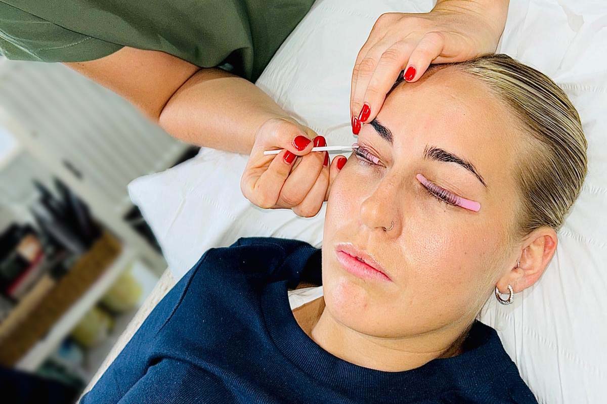 Girl getting her eyelashes tinted